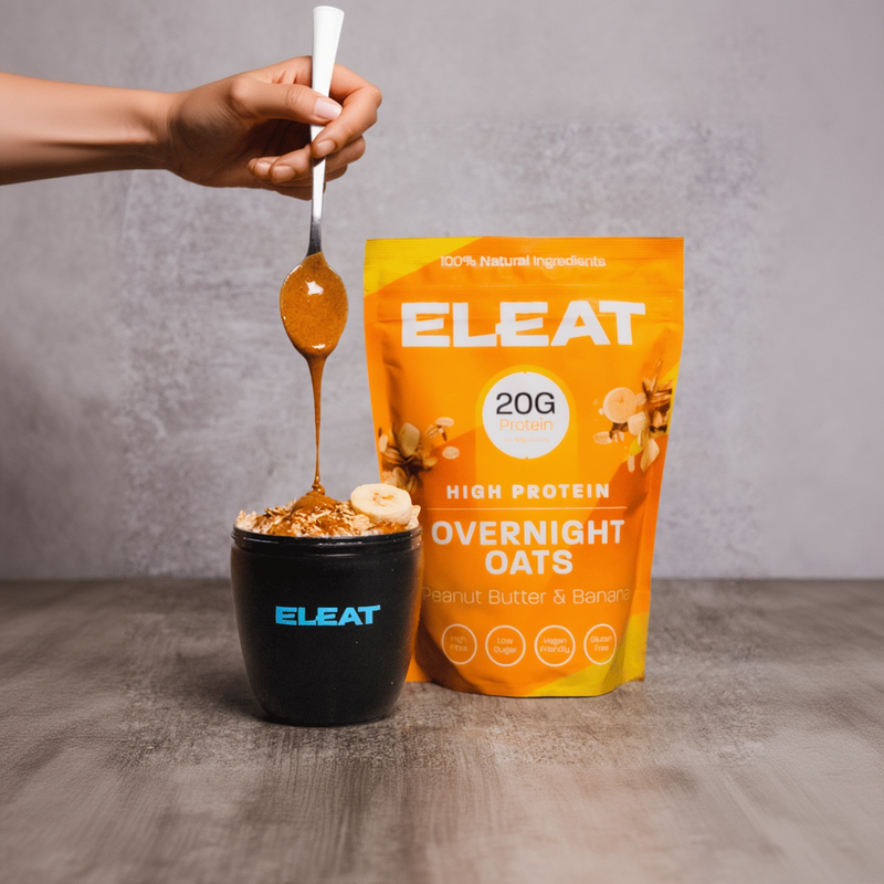 ELEAT high protein overnight oats with a spoonful of oats and a package on a gray background